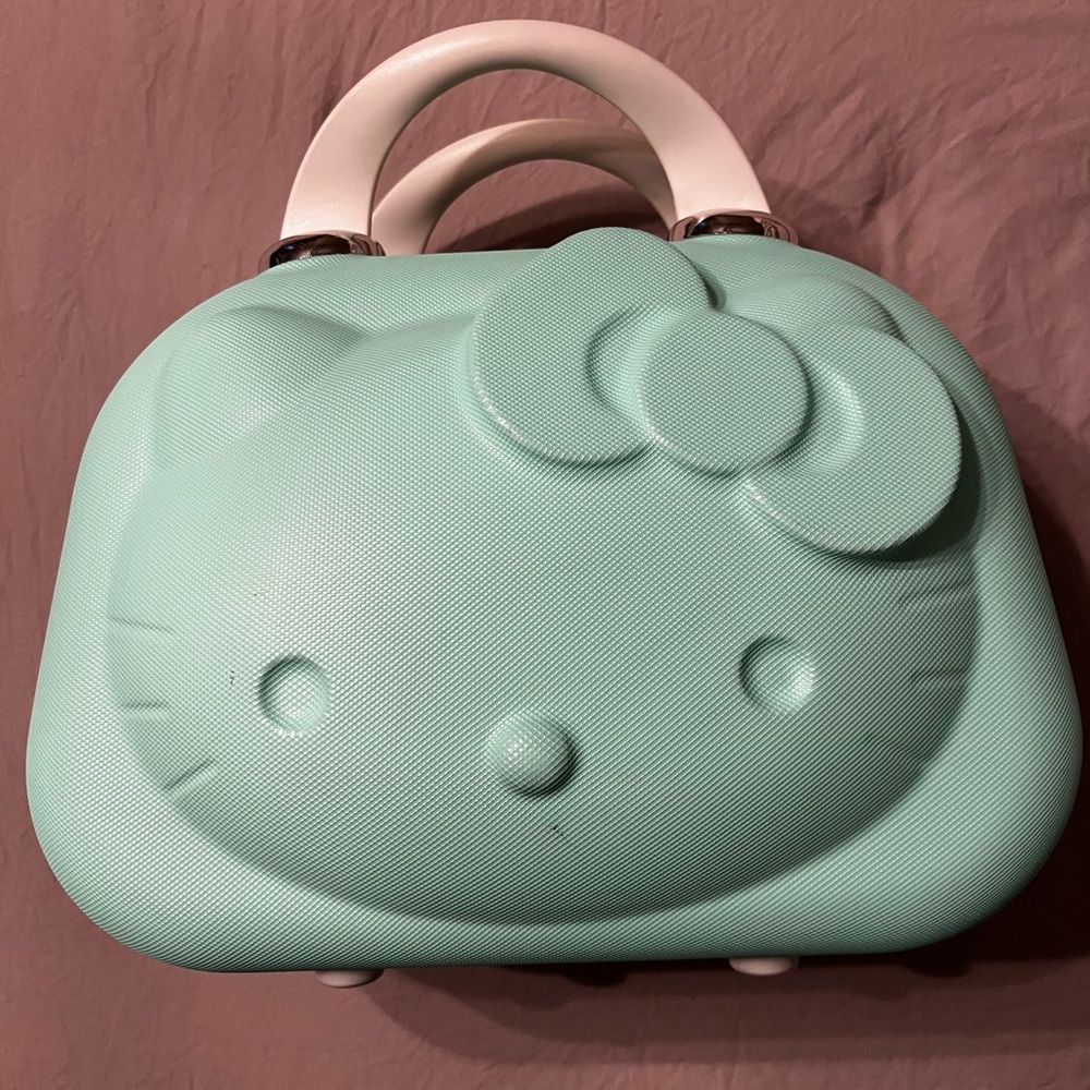 Like NEW Hello Kitty travel travel bag with luggage strap